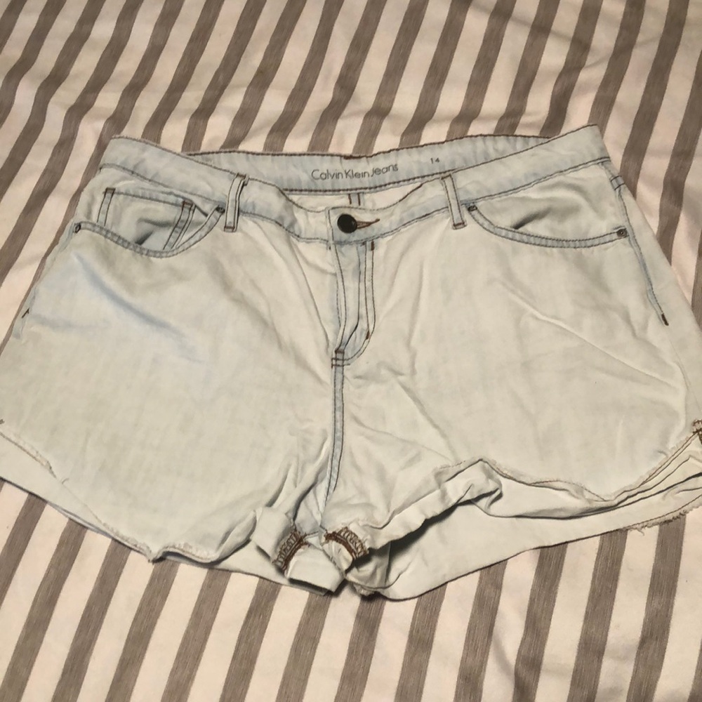Light wash Calvin Klein Jean shorts.